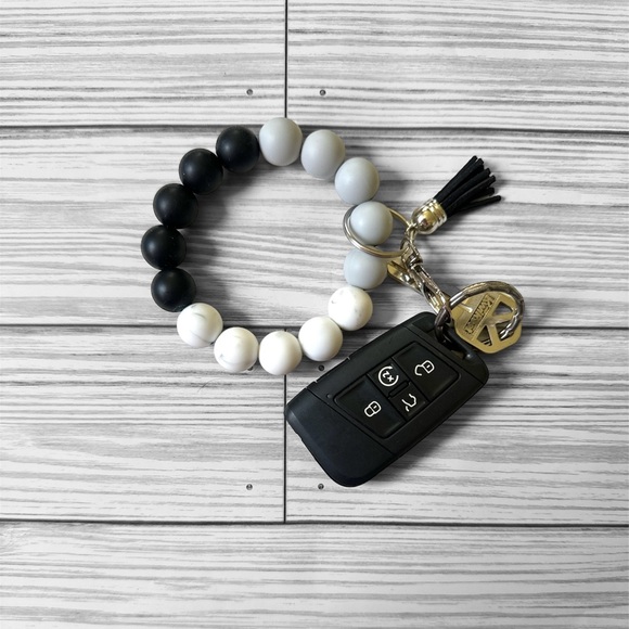 Black, Gray, and White Silicon Wristlet - Picture 2 of 3